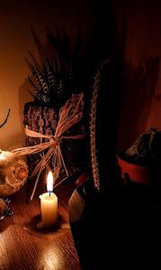 Sacred candle and healing herbs